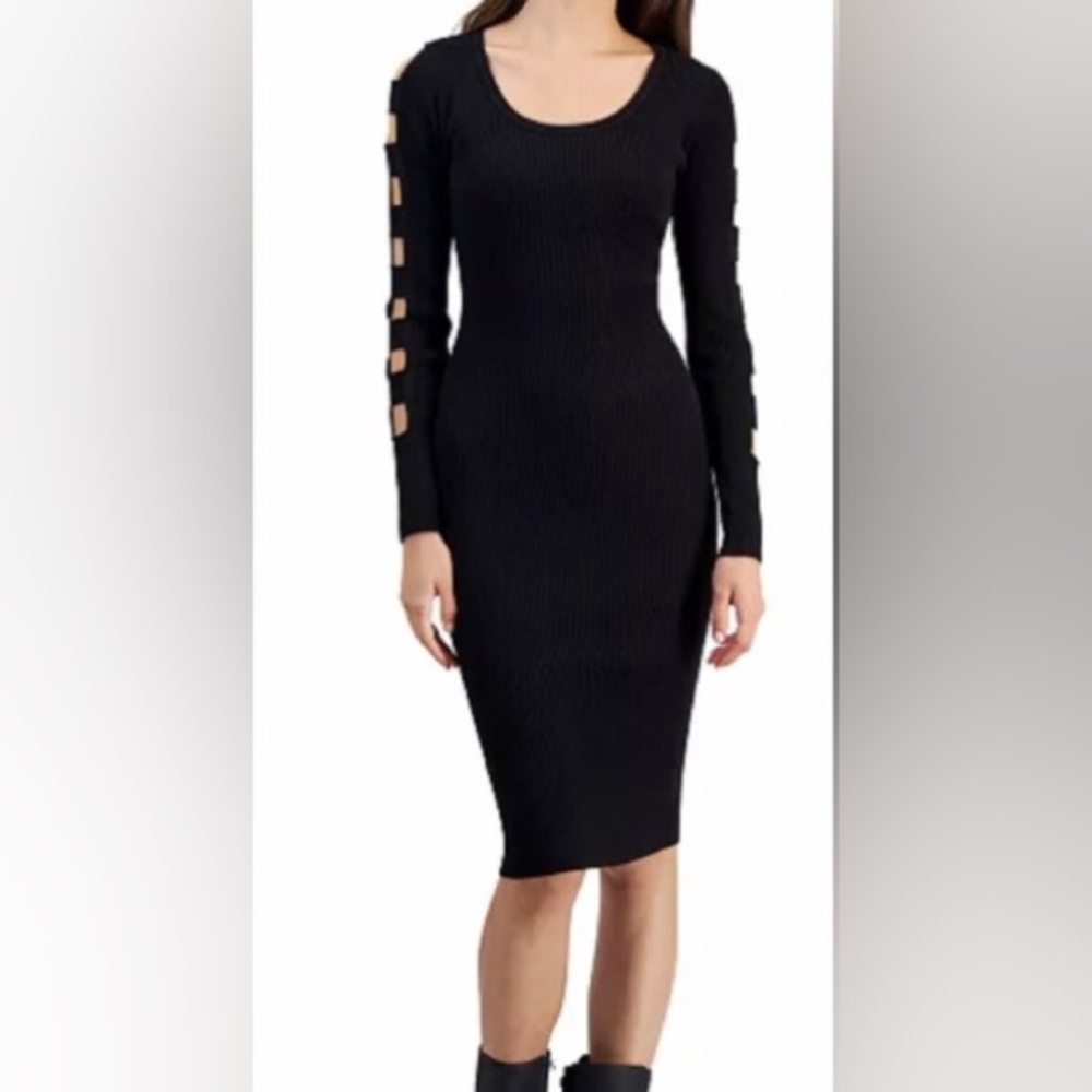Black dress with cutout sleeves.